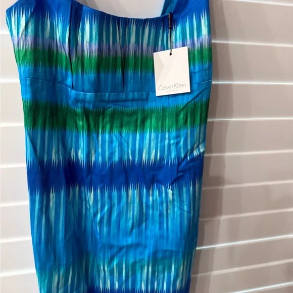 green emerald velvet dress Calvin Klein Women's Short Sleeve A-Line Midi Dress with Belt, Meadow at  Amazon Women's Clothing store main image 0